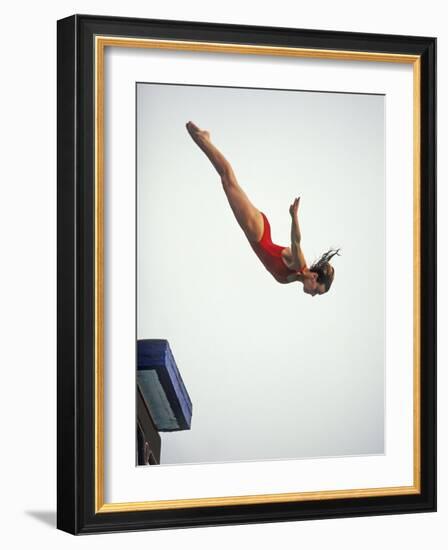 Woman Diver Flying Through the Air, California, USA-Paul Sutton-Framed Photographic Print