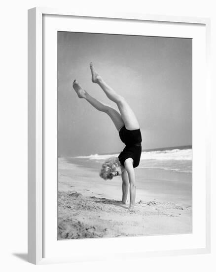 Woman Does Handstand on the Beach (B&W)-Hulton Archive-Framed Photographic Print