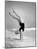 Woman Does Handstand on the Beach (B&W)-Hulton Archive-Mounted Photographic Print