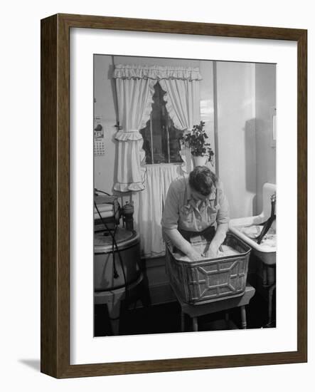 Woman Doing Laundry by Hand after Washing Machine Broke Down-null-Framed Photographic Print