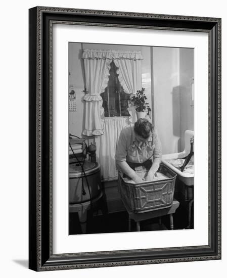 Woman Doing Laundry by Hand after Washing Machine Broke Down-null-Framed Photographic Print