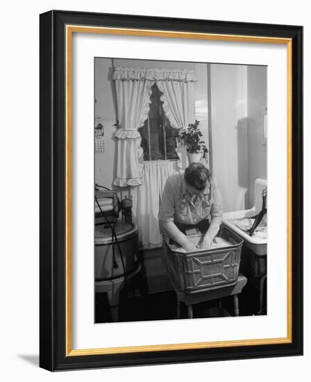 Woman Doing Laundry by Hand after Washing Machine Broke Down-null-Framed Photographic Print