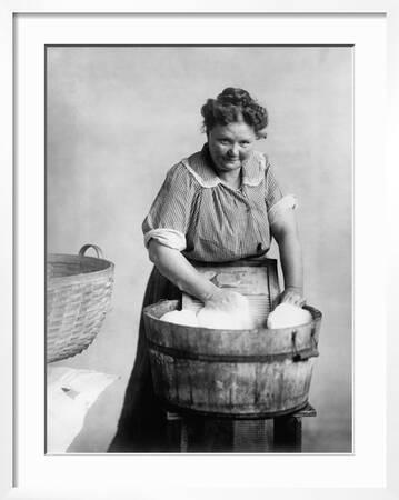 A Black And White Photograph Of A Woman Using A Washboard Stock