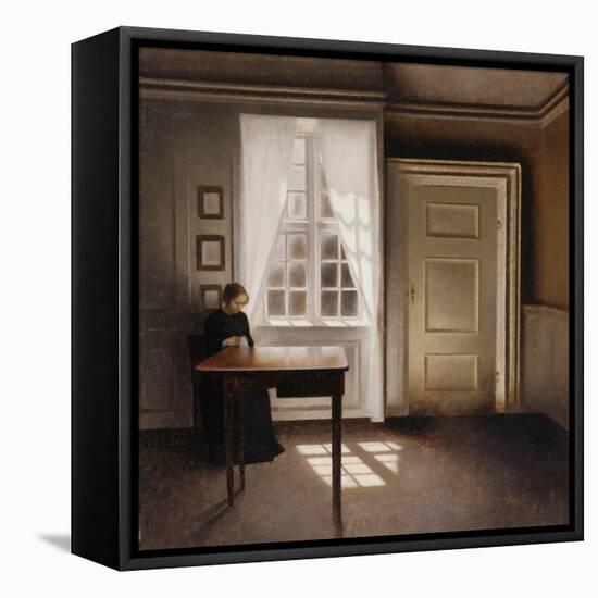 Woman Doing Needle-Work by the Window-Vilhelm Hammershoi-Framed Premier Image Canvas