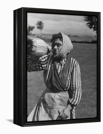 Woman Drinking a Bottles of Wine from a Story Concerning Italy-null-Framed Premier Image Canvas