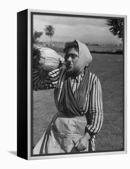 Woman Drinking a Bottles of Wine from a Story Concerning Italy-null-Framed Premier Image Canvas