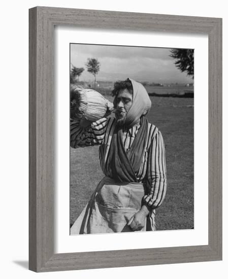 Woman Drinking a Bottles of Wine from a Story Concerning Italy-null-Framed Photographic Print