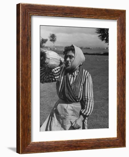 Woman Drinking a Bottles of Wine from a Story Concerning Italy-null-Framed Photographic Print