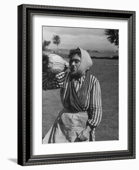 Woman Drinking a Bottles of Wine from a Story Concerning Italy-null-Framed Photographic Print