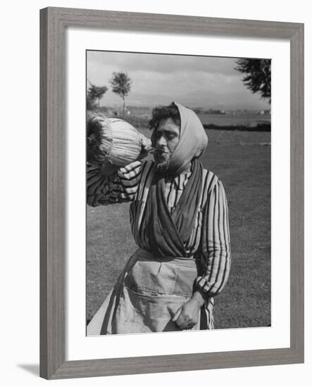 Woman Drinking a Bottles of Wine from a Story Concerning Italy-null-Framed Photographic Print