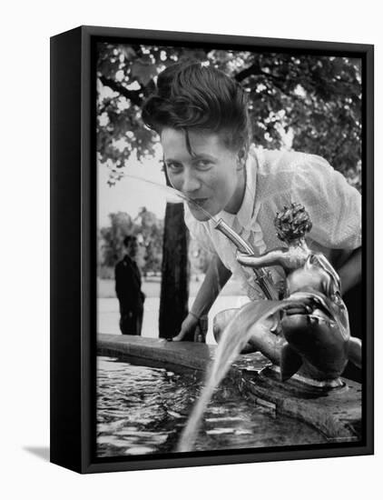 Woman Drinking from a Water Fountain-Yale Joel-Framed Premier Image Canvas