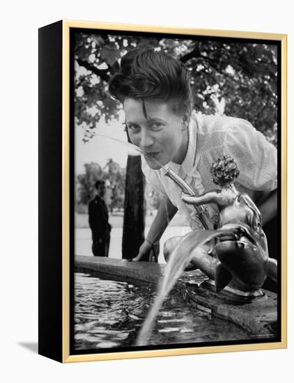 Woman Drinking from a Water Fountain-Yale Joel-Framed Premier Image Canvas