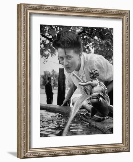 Woman Drinking from a Water Fountain-Yale Joel-Framed Photographic Print