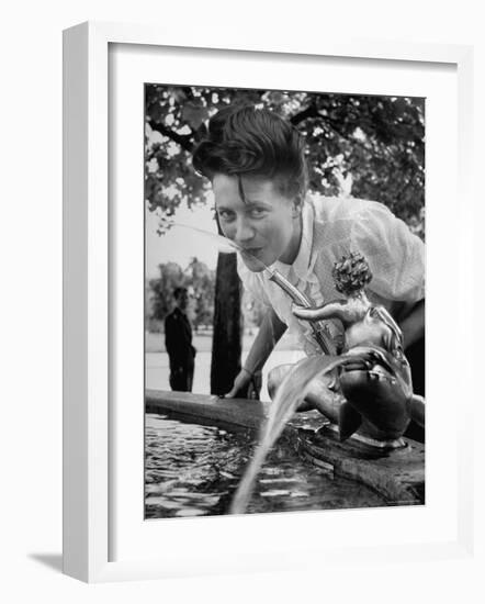 Woman Drinking from a Water Fountain-Yale Joel-Framed Photographic Print