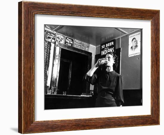 Woman Drinking under Sign, No Beer Sold to Indians, Katherine's Place, Happy Hollow, Fort Peck Dam-Margaret Bourke-White-Framed Photographic Print