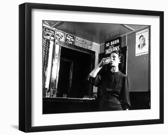 Woman Drinking under Sign, No Beer Sold to Indians, Katherine's Place, Happy Hollow, Fort Peck Dam-Margaret Bourke-White-Framed Photographic Print
