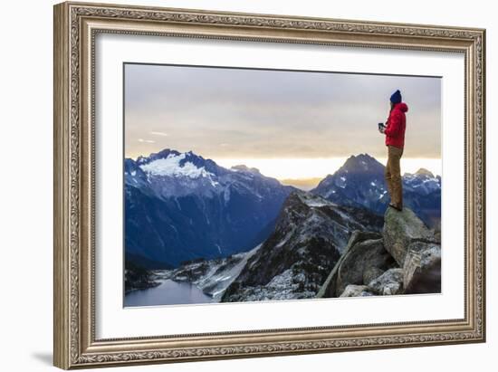 Woman Drinks Her Coffee On Top Of A Mountain In The Morning Looking Out Into The Cascade Mts In WA-Hannah Dewey-Framed Photographic Print