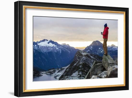 Woman Drinks Her Coffee On Top Of A Mountain In The Morning Looking Out Into The Cascade Mts In WA-Hannah Dewey-Framed Photographic Print