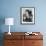 Woman Eating Chocolates Out of a Bowl-null-Framed Photo displayed on a wall