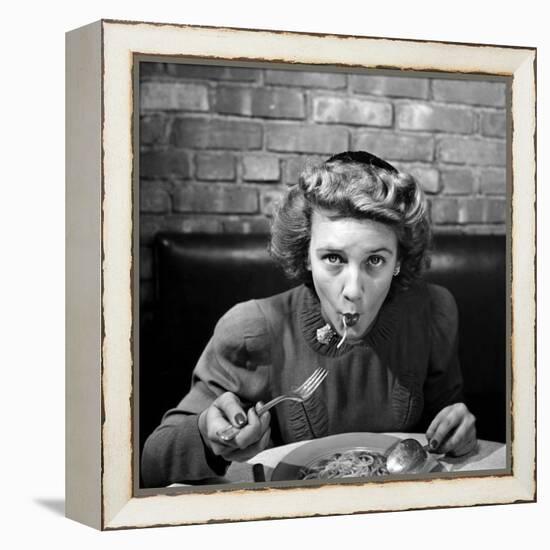 Woman Eating Spaghetti in Restaurant. No.5 of Sequence of 6-Alfred Eisenstaedt-Framed Premier Image Canvas