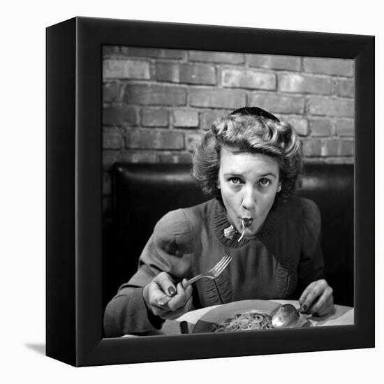 Woman Eating Spaghetti in Restaurant. No.5 of Sequence of 6-Alfred Eisenstaedt-Framed Premier Image Canvas