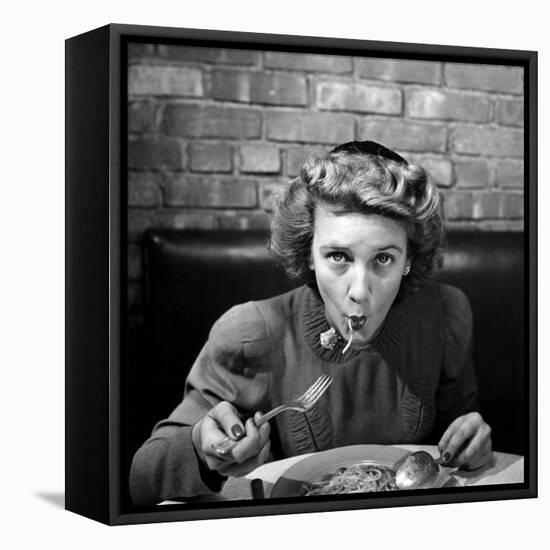 Woman Eating Spaghetti in Restaurant. No.5 of Sequence of 6-Alfred Eisenstaedt-Framed Premier Image Canvas