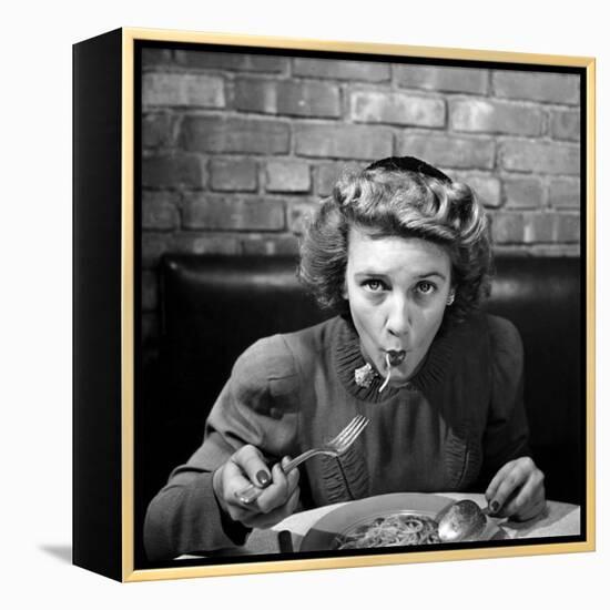 Woman Eating Spaghetti in Restaurant. No.5 of Sequence of 6-Alfred Eisenstaedt-Framed Premier Image Canvas
