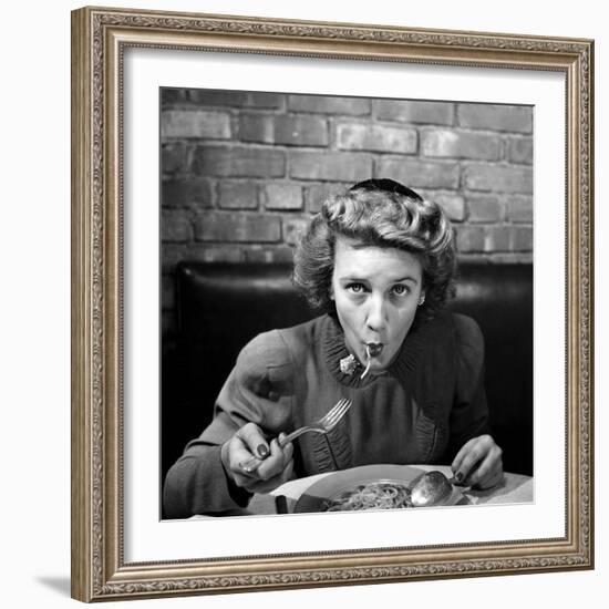 Woman Eating Spaghetti in Restaurant. No.5 of Sequence of 6-Alfred Eisenstaedt-Framed Photographic Print