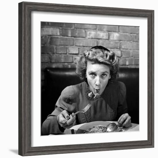 Woman Eating Spaghetti in Restaurant. No.5 of Sequence of 6-Alfred Eisenstaedt-Framed Photographic Print