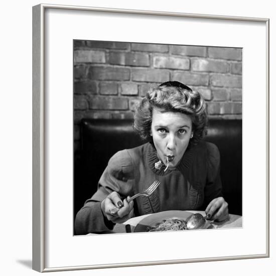 Woman Eating Spaghetti in Restaurant. No.5 of Sequence of 6-Alfred Eisenstaedt-Framed Photographic Print