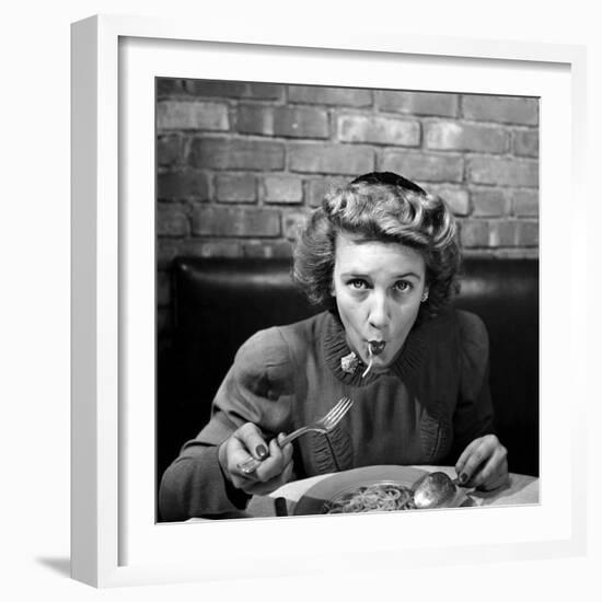 Woman Eating Spaghetti in Restaurant. No.5 of Sequence of 6-Alfred Eisenstaedt-Framed Photographic Print