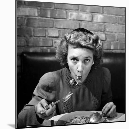 Woman Eating Spaghetti in Restaurant. No.5 of Sequence of 6-Alfred Eisenstaedt-Mounted Photographic Print