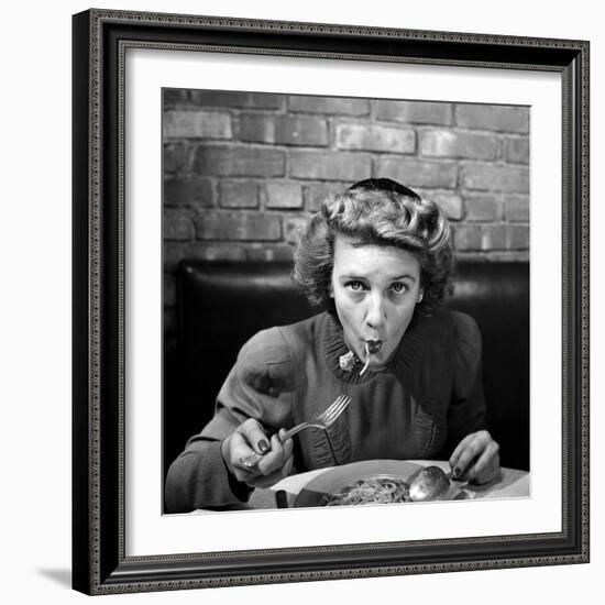 Woman Eating Spaghetti in Restaurant. No.5 of Sequence of 6-Alfred Eisenstaedt-Framed Photographic Print