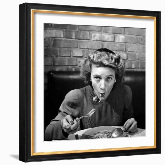 Woman Eating Spaghetti in Restaurant. No.5 of Sequence of 6-Alfred Eisenstaedt-Framed Photographic Print