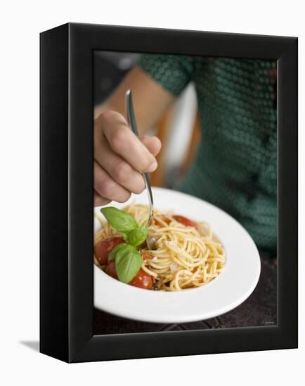 Woman Eating Spaghetti with Tomatoes, Parmesan and Basil-null-Framed Premier Image Canvas