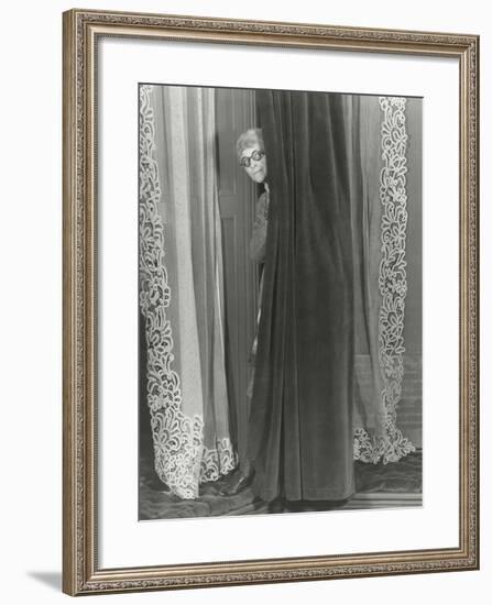 Woman Eavesdropping from Behind Curtain-null-Framed Photo