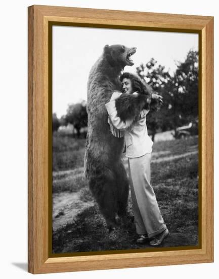 Woman Embraces a Stuffed Bear, Ca. 1940-null-Framed Premier Image Canvas