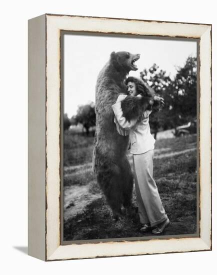 Woman Embraces a Stuffed Bear, Ca. 1940-null-Framed Premier Image Canvas