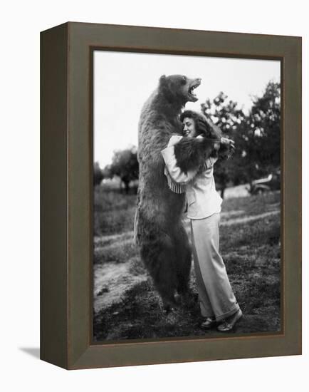 Woman Embraces a Stuffed Bear, Ca. 1940-null-Framed Premier Image Canvas