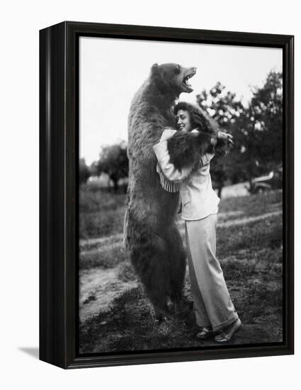 Woman Embraces a Stuffed Bear, Ca. 1940-null-Framed Premier Image Canvas