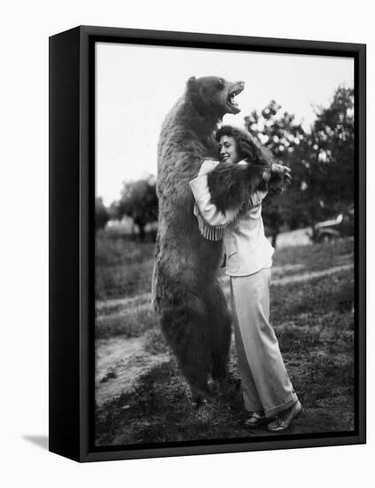 Woman Embraces a Stuffed Bear, Ca. 1940-null-Framed Premier Image Canvas