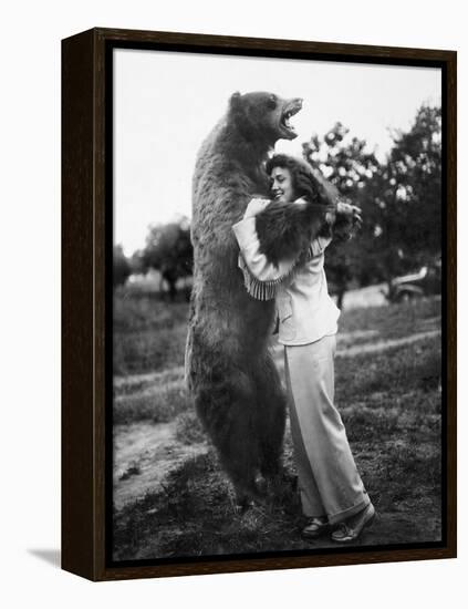 Woman Embraces a Stuffed Bear, Ca. 1940-null-Framed Premier Image Canvas