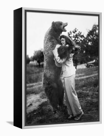 Woman Embraces a Stuffed Bear, Ca. 1940-null-Framed Premier Image Canvas