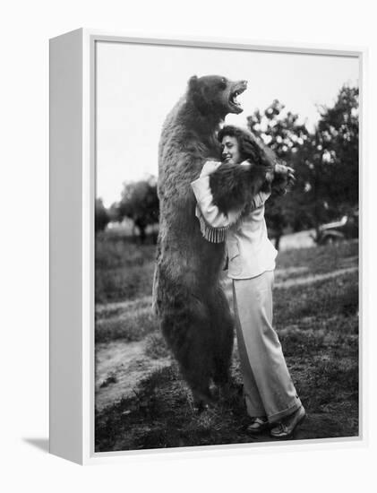 Woman Embraces a Stuffed Bear, Ca. 1940-null-Framed Premier Image Canvas