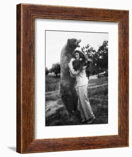 Woman Embraces a Stuffed Bear, Ca. 1940-null-Framed Premium Photographic Print