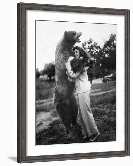 Woman Embraces a Stuffed Bear, Ca. 1940-null-Framed Photographic Print