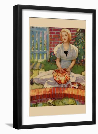 Woman Embroiders By The Side of a Home Pond-null-Framed Art Print