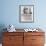 Woman Enjoying a Game of Shuffleboard-null-Framed Photo displayed on a wall