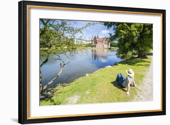 Woman Enjoying the Pond before Castle Egeskov, Denmark-Michael Runkel-Framed Photographic Print