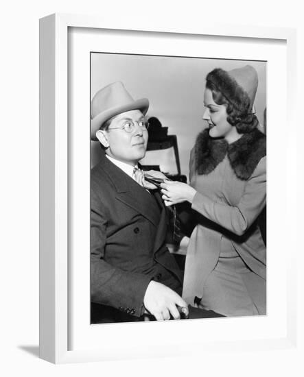 Woman Fixing Mans Tie-null-Framed Photo